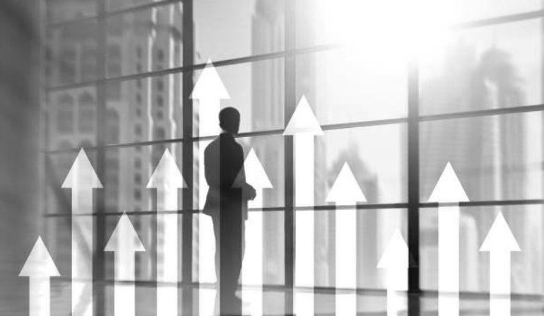 Up arrow graph on skyscraper background. Invesment and financial growth concept.